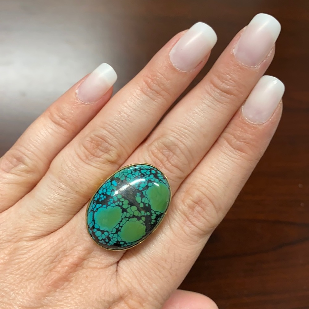 Genuine turquoise in hammered Alchemia gold ring.